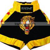 Men muay thai shorts with embroidered tiger logo in black and gold color