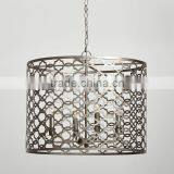 11.29-1 A Statement Lighting Piece Pendants Allover Trellis Pattern a Variety of Prints and Colors in a Room