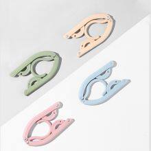 4 Colors to Choose From Convenient Travel Folding Children Adult Plastic Hangers thumbnail-1
