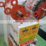 Full Auto Cup Sealing Machine/ Plastic Packaging Material and Electric Driven Type Puffed Food Auto Filling Sealing Machine thumbnail-2