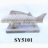 Showing white fish marble fish statue
