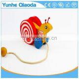 Colorful Pull Along Snail Wooden Toy as You Pull They Make a a Fun Baby thumbnail-1