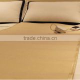 Low voltage A single cream-colored comfortable heating bed sheet