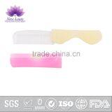 Multi-material Plastic Mini Comb and Massage Hairbrush thumbnail-1