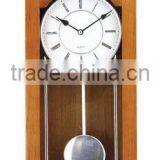 Wooden pendulum clock