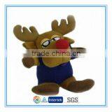 Plush deer with big red nose