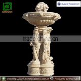 Antique style Egyptian cream marble water fountain with lady statues