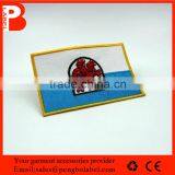 Embroidered Red Octopus Patch in Blue Background Clothing Label