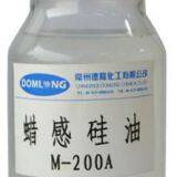 Waxy feeling of silicone fluid, finishing agent, textile auxiliary