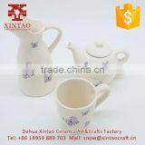 Glazed Full Hand Painted White With Blue Butterfly Ceramic Teapot thumbnail-5