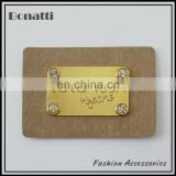custom high quality jeans rhinestone leather metal labels or patches for garment