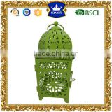 Small green Moroccan metal candle lantern for garden decoration