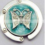 China Wholesale Round Bag Hanger With Butterfly Shape Logo, Butterfly With Rhinestone Purse Hanger for Promotion