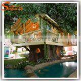 Newest Design China Supplier Large Outdoor Plastic Leaves Wooden Artificial Tree House for Sale thumbnail-1