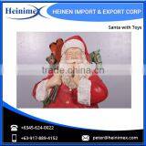 High Quality, Durable, Cold Cast Poly-Resin & Fibre-glass Santa With Toys thumbnail-3
