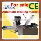 Automatic round bottle labeler machine