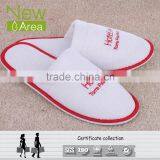Low Price One Color Embroidery Logo Wholesale Hotel Disposable Slipper thumbnail-1
