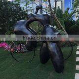 Fiberglass Lover Sculpture With Bike thumbnail-3