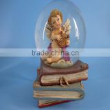 Fashionable resin material and baby angel snow globe