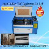 Дешёвый мини-лазерный гравировально-резальный станок на основе CO2 для хобби thumbnail-2