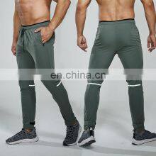 Quick Dry Elastic Drawstring Waist Sports Gym Pants With Zip Side Pocket Reflective Stripe Men's Workout Training Jogging Wear thumbnail-1
