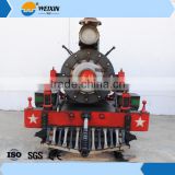 Outdoor steam model train with christmas decotation