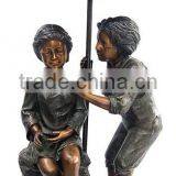 Bronze Mother and Children Statues Under Umbrella thumbnail-1
