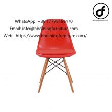 Plastic upholstered dining chair with wooden legs