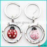 China Wholesale Keychain Metal Rotating Keychain thumbnail-4
