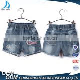 China apparel factory elastic ribbon waistband kids printed shorts jeans with hole