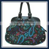 printed canvas handbag with leather trim