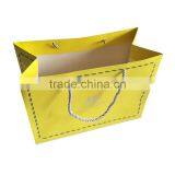 Custom Yellow Hot Stamping Silver Logo Paper Gift Bag With Drawstring Handle