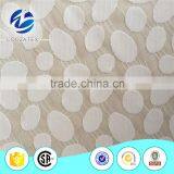 Cheap African Eyelet Stretch Lace Fabric in Dubai Textile Market With Oval Shape