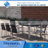 imitating stone patio table top, black rattan garden chairs, 6 chairs with 1 patio table wicker patio set(SSC008)