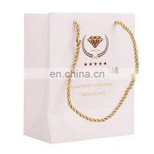 Black Embossed Gold Logo Paper Shopping Bag With Handle thumbnail-1