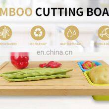Bamboo Cutting Board With 4 Collapsible Silicone Food Storage Containers thumbnail-3