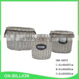 Grey wicker round shape log storage basket with burlap liner