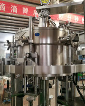 Rotary Star Wheel Type Small Glass Bottle Filling Machine thumbnail-5