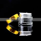 clear glass jar with shiny gold cap