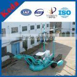 Watermaster With Excavator Bucket and Cutter Head