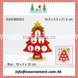 Red christmas tree ornament of wooden christmas decoration
