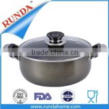 big cooking saucepot with glass lid