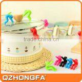 Hot Sale Man Shape Silicone Pot Spill-Proof, Kitchen Gadget, Phone Holder thumbnail-2