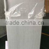 Twin Refrigerators and Freezers Stand Side by Side thumbnail-4