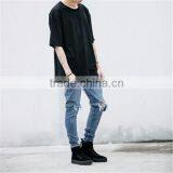 Slightly Faded Blue Jeans With Zip Down Whiskering Ripped Pants thumbnail-2