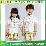 Hot Selling Kindergarten Uniform New Fashion Primary School Uniform White Shirt and Yellow Checked Shorts or Skirt thumbnail-3