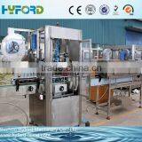 Automatic PET bottle shrink sleeve labeling machine