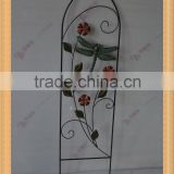 Dragonfly with flower and leaf design wrought iron trellis