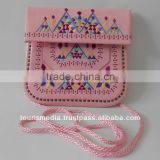 handstitched moroccan pink leather clutch with removable shoulder strap
