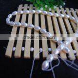 8-9mm White Rice Shape Freshwater Pearl Strand thumbnail-3